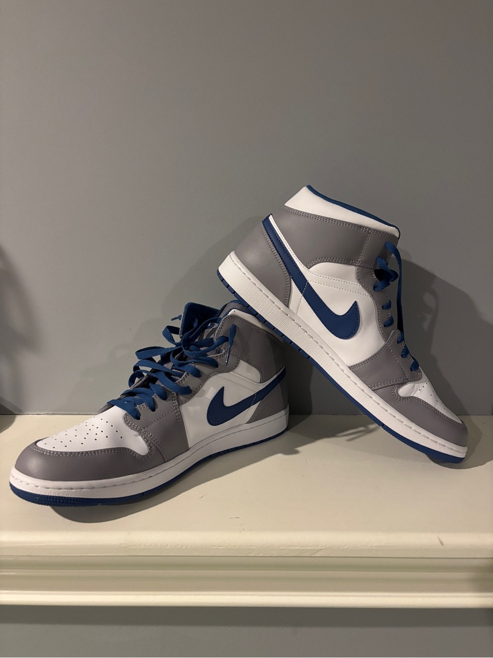 Air Jordan 1 Mid in grey and royal blue leather